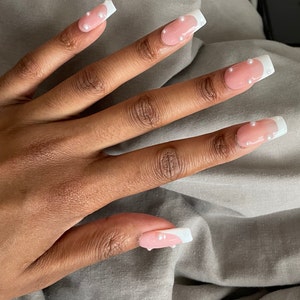 Tej added a photo of their purchase