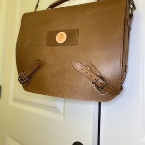 Jenny added a photo of their purchase