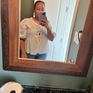 Nadia added a photo of their purchase