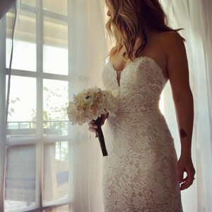 Scott Williams added a photo of their purchase