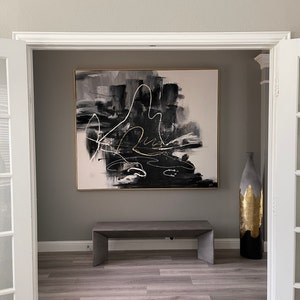 Lynette added a photo of their purchase