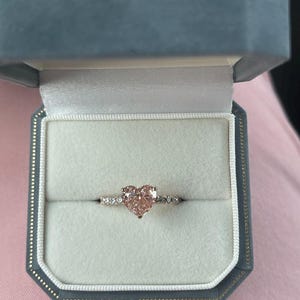 Adriana added a photo of their purchase