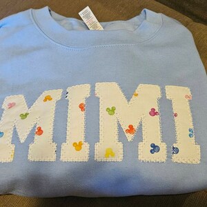 Simply Love Full Size IN MY MAMA EAR Graphic Sweatshirt