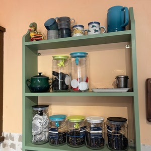 Helen added a photo of their purchase