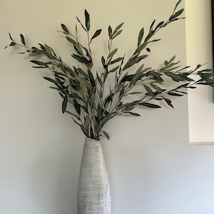 Carmela added a photo of their purchase