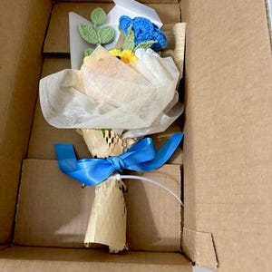 Laura added a photo of their purchase