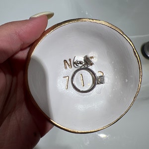 Natalia added a photo of their purchase