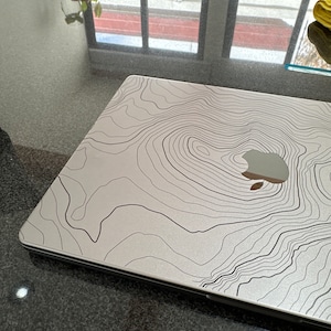 César added a photo of their purchase