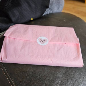 Tracey added a photo of their purchase