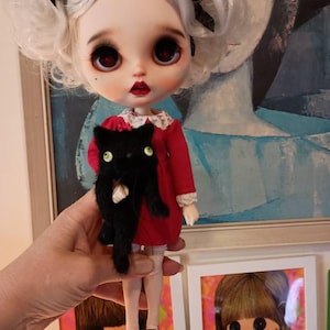 Greta added a photo of their purchase