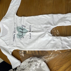 Sarah added a photo of their purchase