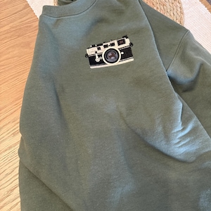 Sarah added a photo of their purchase