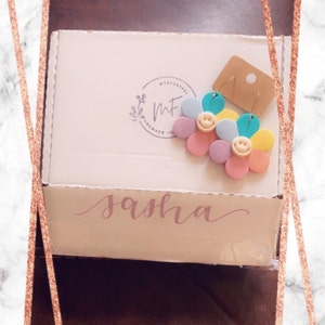 Sasha added a photo of their purchase