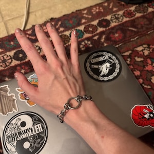 sam added a photo of their purchase