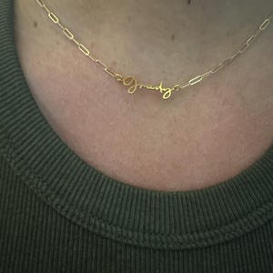 Customer photo, Cursive Name Necklace