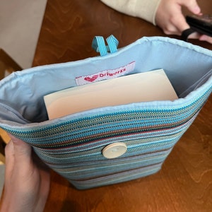 Astrid added a photo of their purchase