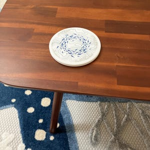 Cheryl added a photo of their purchase