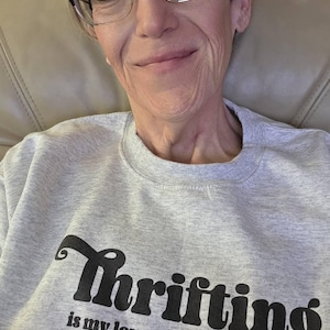 Sandra added a photo of their purchase