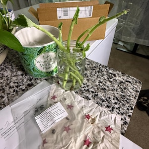 Sharon added a photo of their purchase
