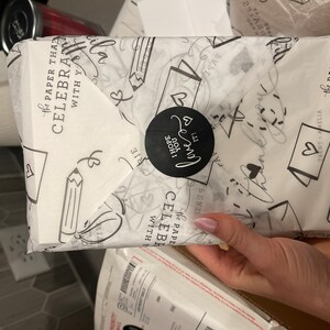 Amelia added a photo of their purchase