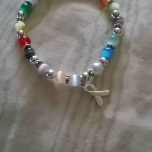 Cancer Awareness Bracelet (6mm Stretchy 18 Colors) Fits Most Adults. Great for Fundraisers or Showing support.