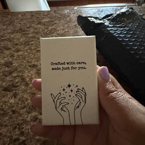 Racquel added a photo of their purchase