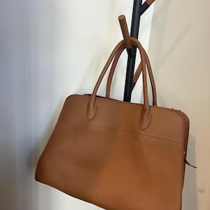 Nneka added a photo of their purchase