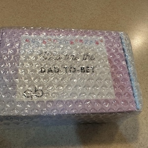 Christina added a photo of their purchase