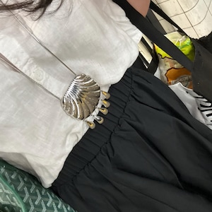 Francesca added a photo of their purchase