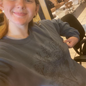 Isabel added a photo of their purchase