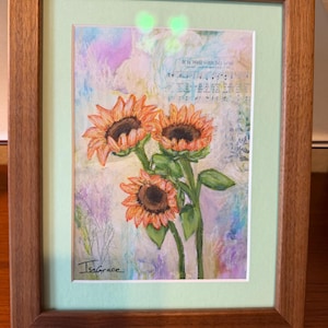 Liz added a photo of their purchase