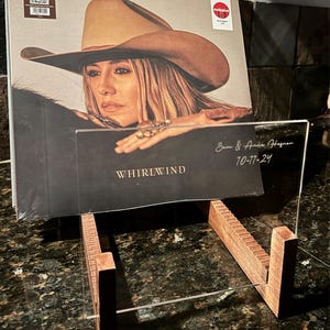 Lisa added a photo of their purchase