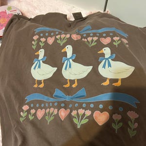 Vivienne adicionaram uma foto da sua compra