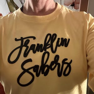 Sally added a photo of their purchase