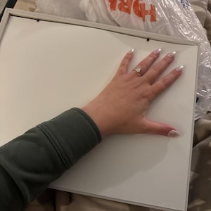 Stephanie added a photo of their purchase