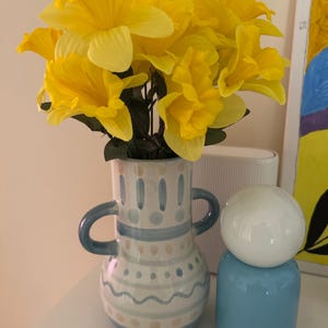 Pooja added a photo of their purchase