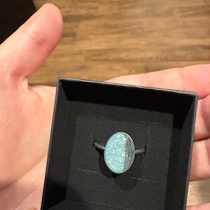 Caitlin added a photo of their purchase