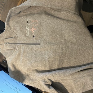Ashley added a photo of their purchase