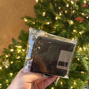 Elaine added a photo of their purchase