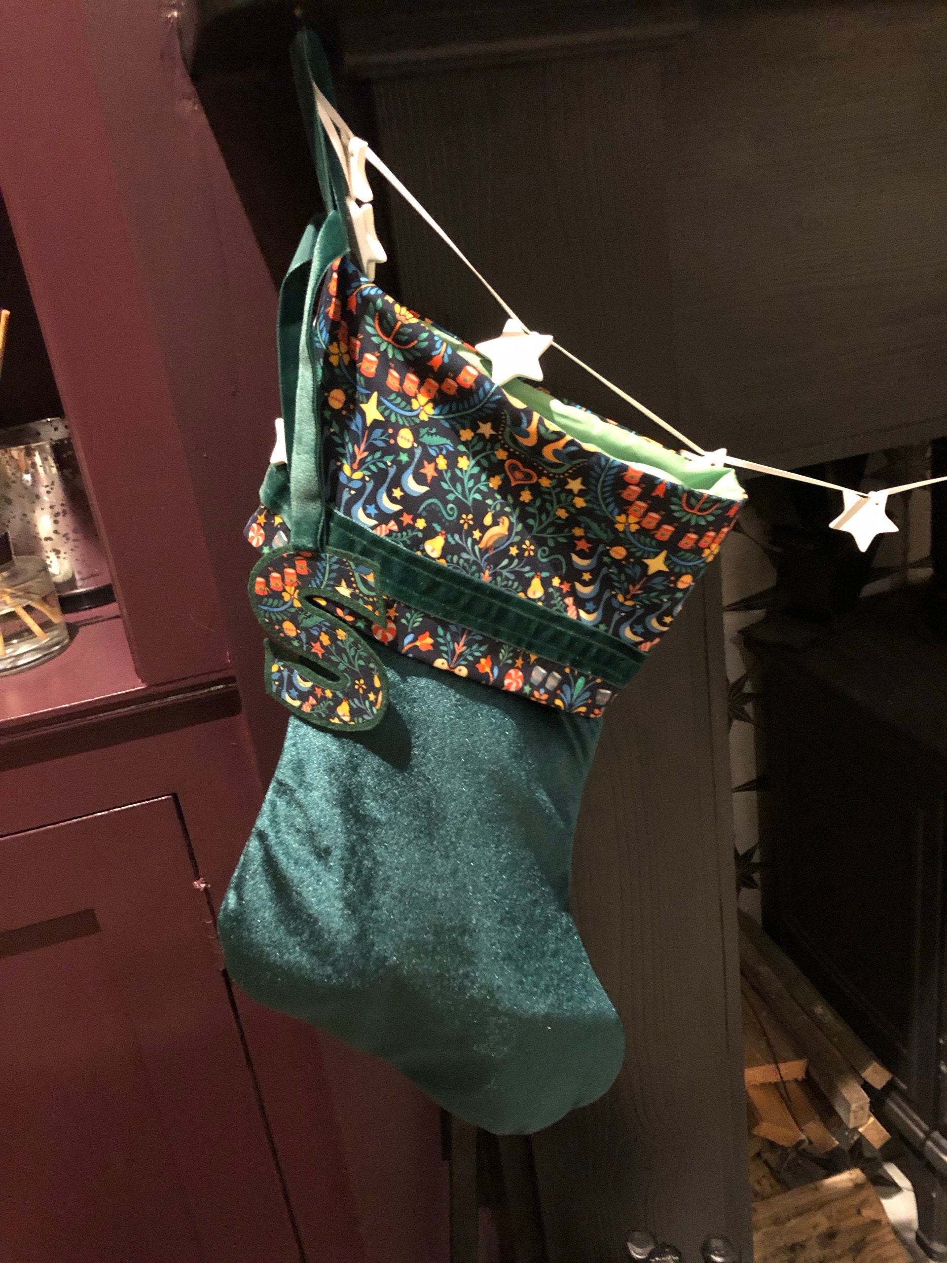 Liberty and velvet Christmas stocking with optional personalisation.