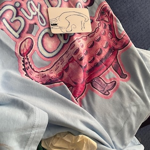 Samantha added a photo of their purchase