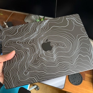 Tom added a photo of their purchase