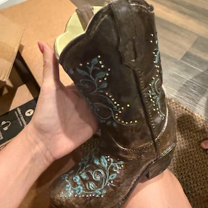 Cynthia added a photo of their purchase