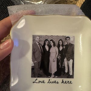 Nicole added a photo of their purchase