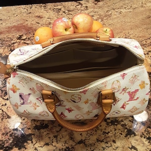 Laura added a photo of their purchase