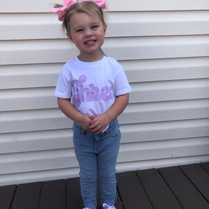 Neely added a photo of their purchase