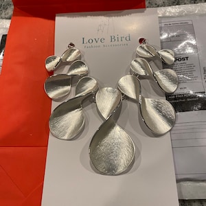 Giselle added a photo of their purchase