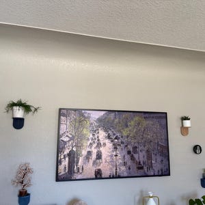 Adriana added a photo of their purchase