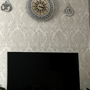 Aishah added a photo of their purchase