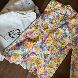 Jen adicionaram uma foto da sua compra